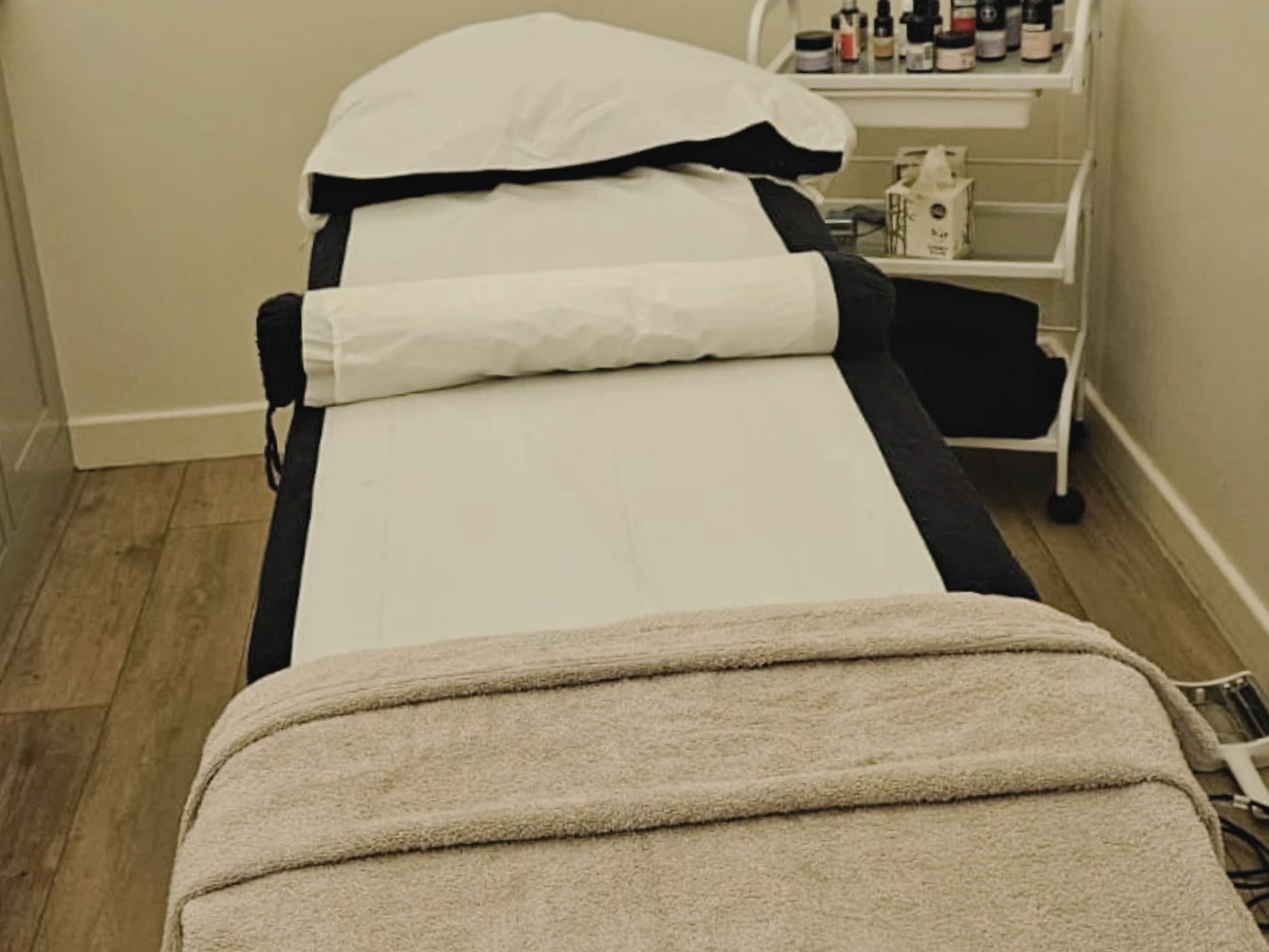 Prepared massage bed in the therapy room